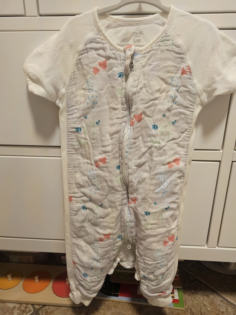 NEST Fragrances White Baby Romper with Coral & Light Blue Accents